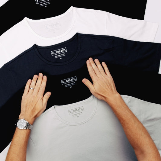 Neutral Color T-Shirts Being Lined up on a Table